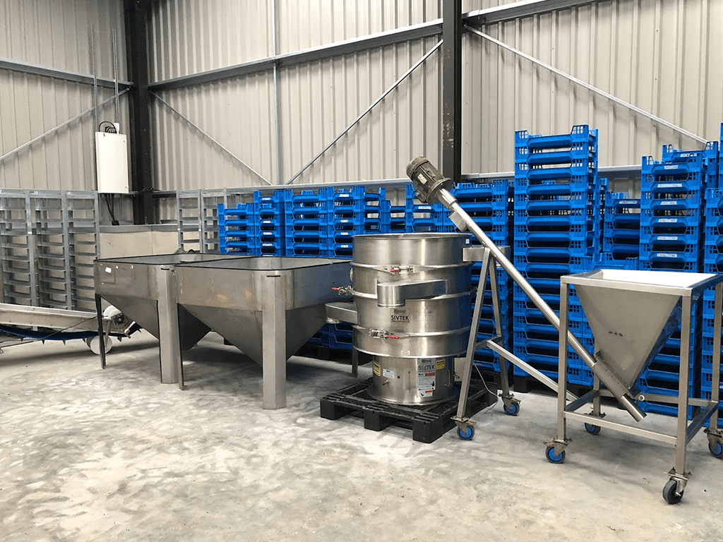 Insect farming processing equipment and trays at Flybox facility